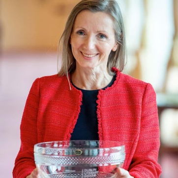 Anna Burns Darren Cool Photocall Ireland Seated with award in lap