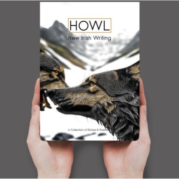 Two hands are holding a copy of HOWL which has a picture of two wolves on the cover with a snowy mountainous background