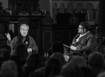 A black and White Image of Author John anville and Historian Donal Fallon from their event at The Pepper Canister Church
